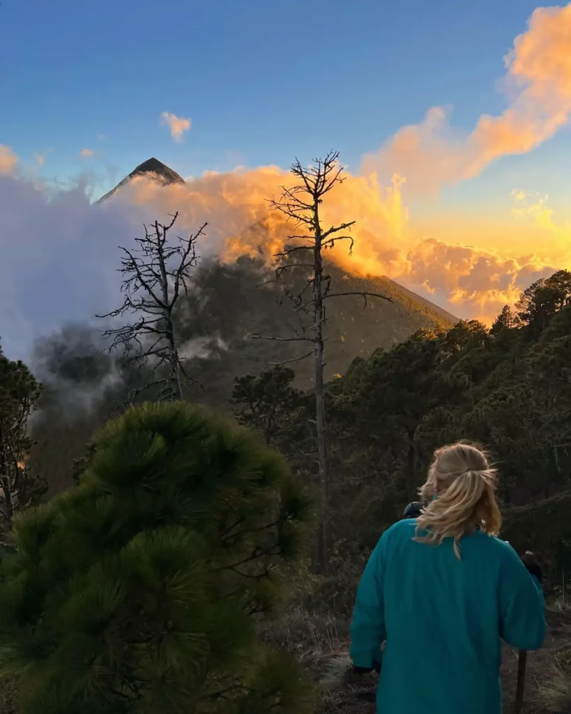 a hiker during the ascent of the Santa María Volcano at dawn